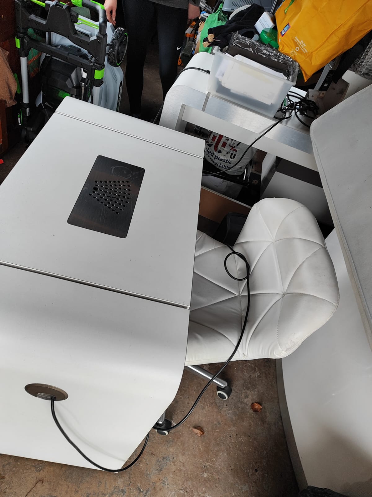 REM white Leather technician chairs on wheels.